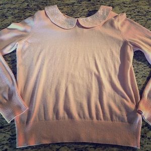 Soft pink, conservative but cute sweater!